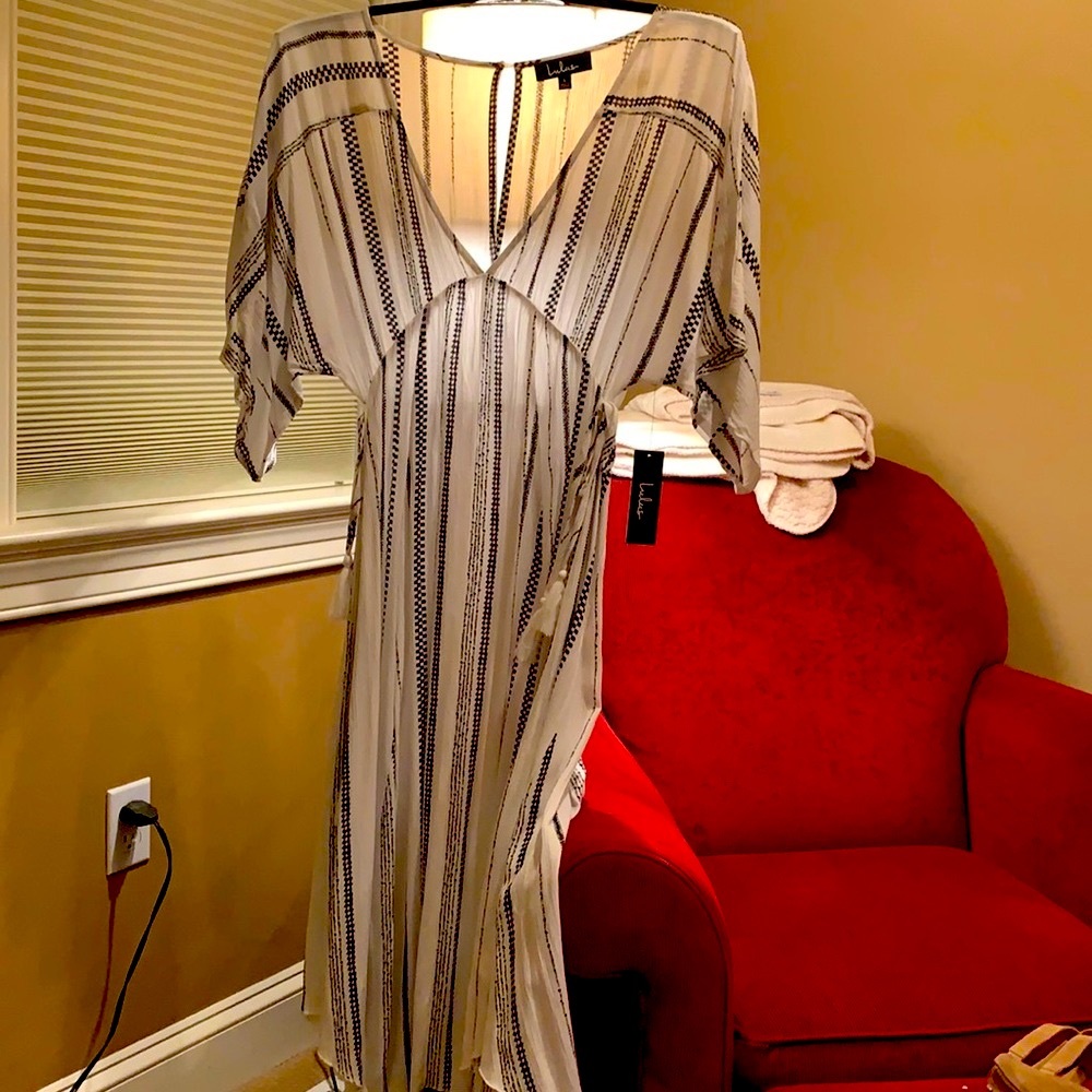 Beautiful waist accentuating cover/ beach dress.